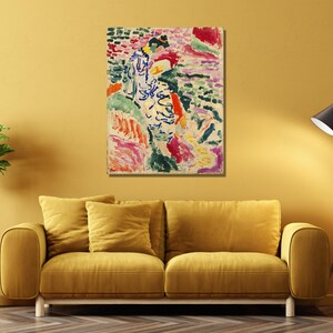 May include: Abstract painting with a colorful, expressive style. The painting features a figure in a white and blue dress, surrounded by vibrant colors and brushstrokes. The colors include pink, red, green, yellow, and blue.