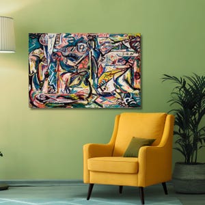 May include: A rectangular canvas wall art piece featuring an abstract expressionist painting with a chaotic composition of thick black lines, vibrant splashes of red, yellow, blue, and white paint, and various indistinct, fragmented geometric shapes.