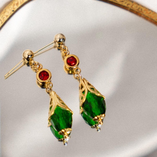 Pendragon Earrings: Gold Anime Dangle Earrings with Green Drops