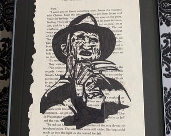 Arte enmarcado de la silueta de la página del libro de Freddy Krueger