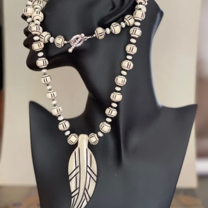 Handcrafted Bone Beaded Jewelry | Unique Tribal-Inspired Accessory | Boho Chic Jewelry | Natural Bone Beads | Ethnic Necklace and Pendant