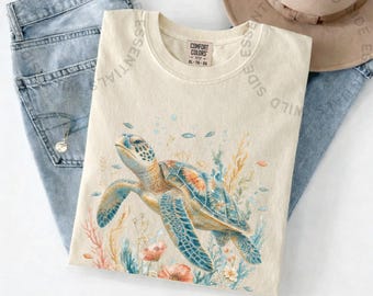 Camiseta de tortuga marina en acuarela / Camiseta con estampado floral de arrecife de coral / Camiseta de naturaleza oceánica / Regalo para amantes de las tortugas marinas / Camiseta de vida marina en acuarela