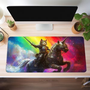 May include: A colorful rainbow background with a cat dressed as a knight riding a unicorn. The cat has a sword in its paw and the unicorn has a horn and a golden crown. The text "Join the Magic" is at the bottom of the image.