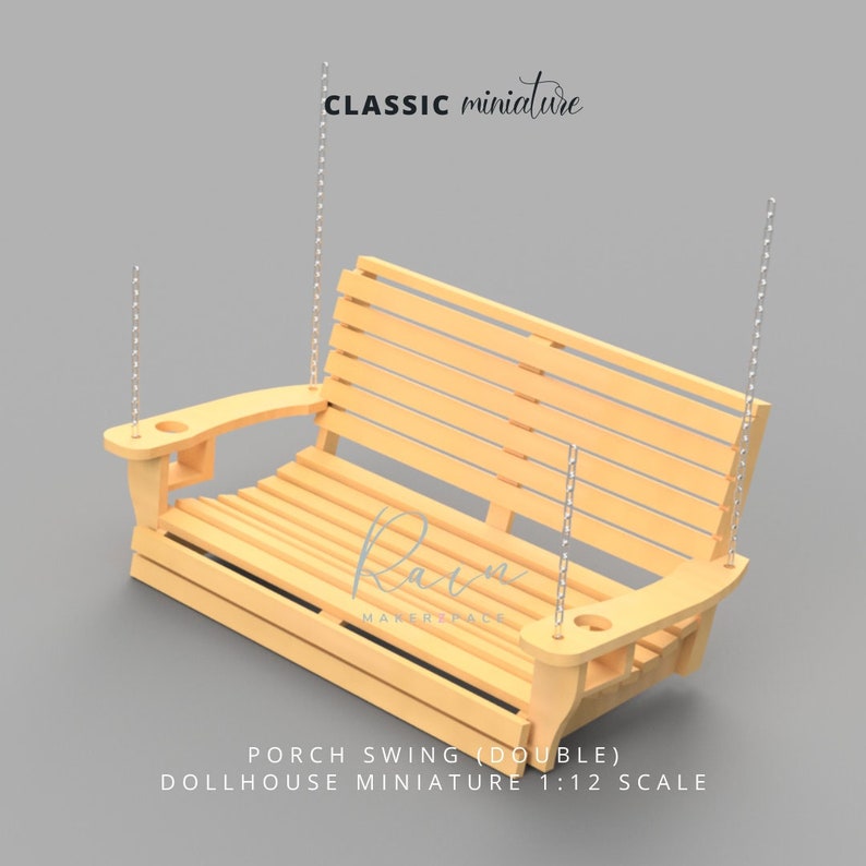 May include: A light wood-colored dollhouse porch swing with a slatted seat and back, suspended by silver chains. The swing has armrests with cup holders. Text on the image reads "CLASSIC miniature" and "PORCH SWING (DOUBLE) DOLLHOUSE MINIATURE 1:12 SCALE."