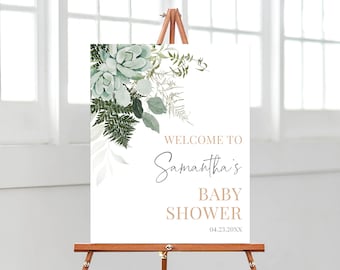 May include: A white welcome sign with a green floral design and the text "Welcome to Samantha's Baby Shower 04.23.20XX".