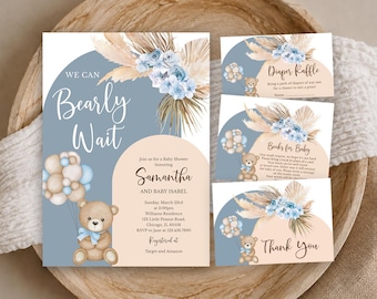 May include: A baby shower invitation set featuring a teddy bear holding blue and tan balloons, blue flowers, and dried pampas grass. The text reads We Can Bearly Wait, Samantha and Baby Isabel, Diaper Raffle, Books for Baby, and Thank You.