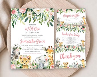 May include: A baby shower invitation set featuring watercolor illustrations of a zebra, lion cub, elephant, and giraffe adorned with pink and white floral crowns. The text includes A LITTLE WILD ONE IS ON THE WAY, Samantha Green, diaper raffle, books for baby, and thank you.