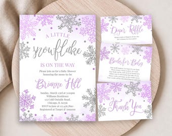 May include: A baby shower invitation set featuring purple and silver snowflake designs. The main card reads A LITTLE SNOWFLAKE IS ON THE WAY, honoring Brianne Hill, with event details. Smaller cards include Diaper Raffle, Books for Baby, and Thank You.