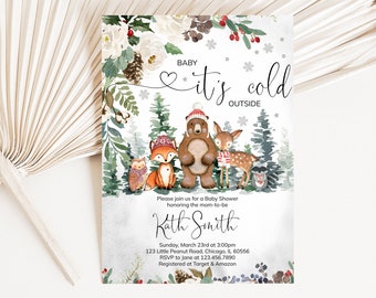 May include: Baby shower invitation with watercolor illustrations of woodland animals, including a bear, fox, deer, and owl, in winter attire. The text reads "Baby it's cold outside" with event details below. The invitation is decorated with winter foliage.