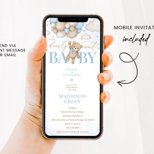 May include: A blue and white baby shower invitation featuring a teddy bear holding balloons. The invitation reads "We can barely wait" and "Baby". It includes the name Nathan, the date and time of the shower, the location, and RSVP details.