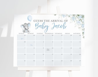 Op de afbeelding: Een blauw en wit baby shower spel met een kalender waarop gasten de aankomstdatum van Baby Jacob kunnen raden. De kalender is versierd met een schattige cartoon-olifant die een blauwe ballon vasthoudt.