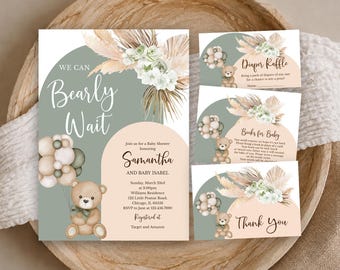 Peut inclure: Un ensemble de papeterie pour fête prénatale avec un ours en peluche, des ballons et des fleurs séchées. Les cartes présentent des textes comme We Can Bearly Wait, Diaper Raffle, Books for Baby et Thank You, sur des arches vert sauge et beige.