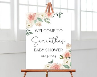 May include: Welcome to Samantha's Baby Shower sign with a floral design featuring pink and white flowers and green leaves. The date of the shower is 01-23-2024.