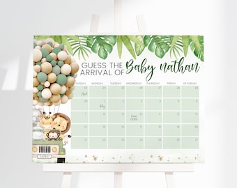 May include: A rectangular sign featuring a calendar for April and May with the text GUESS THE ARRIVAL OF Baby nathan. It displays a green safari jeep with cartoon animals and a large cluster of beige, white, and sage green balloons.