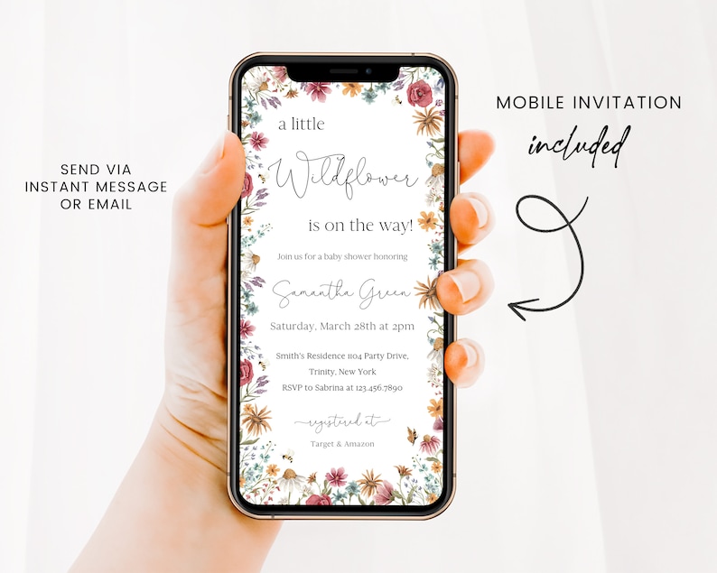 May include: A mobile phone screen displaying a baby shower invitation with a floral design. The invitation reads "a little wildflower is on the way!" and includes the name "Samantha Green", the date "Saturday, March 28th at 2pm", the location "Smith's Residence no Party Drive. Trinity, New York", and the RSVP information "RSVP to Sabrina at 123.456.7890". The invitation also includes the text "registered at Target & Amazon".