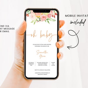 May include: A smartphone displays a baby shower invitation with floral accents. The invitation includes the text "oh baby", event details, and the name Samantha Green. The phone is held in a hand, with additional text indicating a mobile invitation.