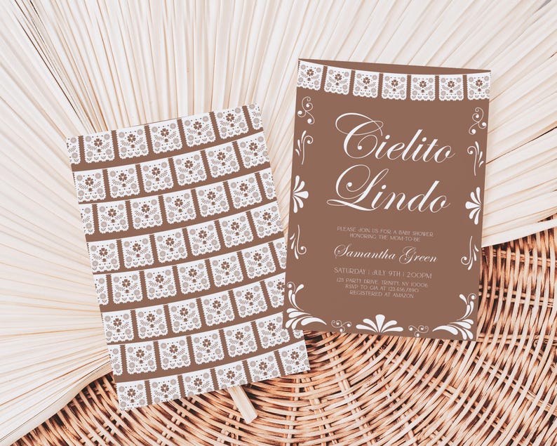 May include: Two brown rectangular cards with white decorative paper cut-out patterns. One card features the text Cielito Lindo, baby shower details for Samantha Green, and date and time information. The other card displays a repeating pattern of white floral motifs.
