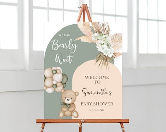 May include: A green and peach welcome sign for a baby shower with the text "We can Bearly Wait" and a teddy bear holding balloons. The sign also says "Welcome to Samantha's Baby Shower 08.08.XX".