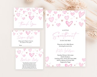 May include: Baby shower invitation set with pink watercolor hearts and gold accents. Includes a main invitation, thank you card, diaper raffle card, and a book request card. The main invitation reads "A Little Sweetheart Is On The Way!"