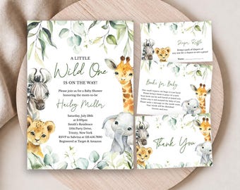 May include: A baby shower invitation set featuring watercolour illustrations of a zebra, lion cub, giraffe, and elephant surrounded by eucalyptus leaves. The text reads A LITTLE Wild One IS ON THE WAY, Hailey Miller, Diaper Raffle, and Books for Baby.