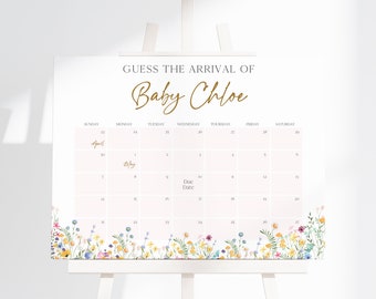 May include: A white sign featuring the text GUESS THE ARRIVAL OF Baby Chloe in gold script. Below is a calendar grid for April and May with a Due Date label. The bottom border is decorated with a colorful watercolor illustration of wildflowers.