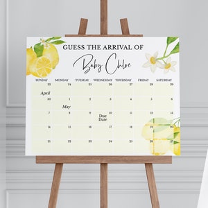 Op de afbeelding: Een geel en wit baby shower-spel met een citroen-thema met een kalender om de komst van Baby Chloe te raden. De kalender is voor april en mei met de uitgerekende datum gemarkeerd.