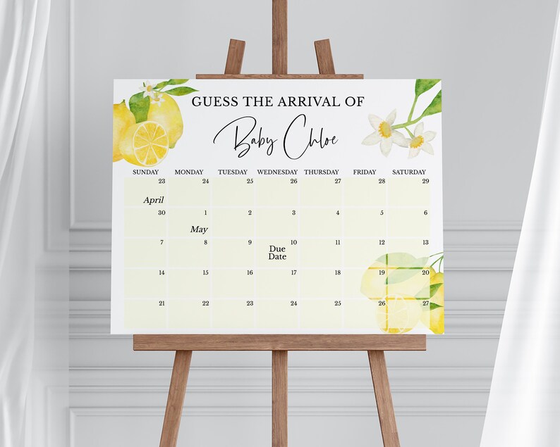 Op de afbeelding: Een geel en wit baby shower-spel met een citroen-thema met een kalender om de komst van Baby Chloe te raden. De kalender is voor april en mei met de uitgerekende datum gemarkeerd.