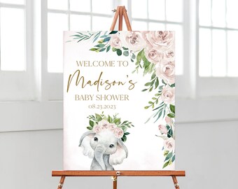 May include: Welcome to Madison's Baby Shower sign with a watercolor illustration of a pink floral arrangement and a cute elephant with a floral crown. The date of the shower is 08.23.2023.