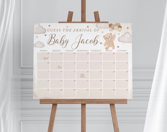 May include: A baby shower game with a calendar to guess the arrival date of Baby Jacob. The calendar is decorated with clouds, stars, and a teddy bear holding balloons.