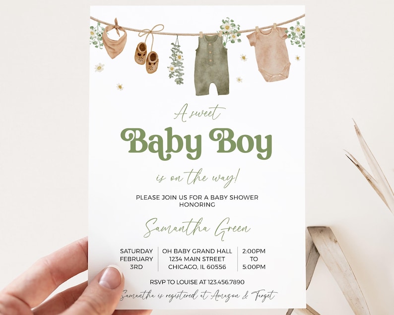 May include: Baby shower invitation with the text "A sweet Baby Boy is on the way!" in green. The invitation features watercolor illustrations of baby clothes and accessories hanging on a clothesline. The invitation is for Samantha Green.