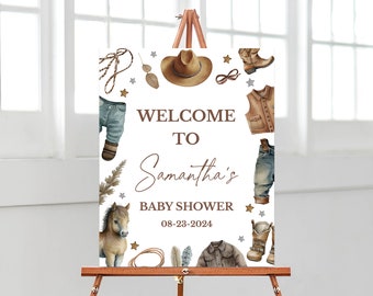 May include: Welcome to Samantha's Baby Shower sign with a western theme. The sign features a brown cowboy hat, blue jeans, cowboy boots, a lasso, and a brown horse. The date of the shower is 08-23-2024.