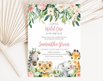 May include: A rectangular baby shower invitation card featuring watercolor illustrations of a zebra, lion cub, elephant, and giraffe wearing floral crowns. The text reads A LITTLE Wild One IS ON THE WAY, honoring Samantha Green, Saturday, August 23rd at 4:00PM.