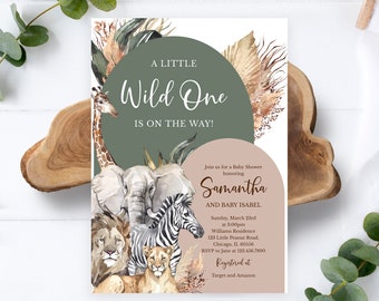 May include: A baby shower invitation with a green and brown watercolour background featuring a giraffe, elephant, zebra, and lion. The text reads "A Little Wild One is on the way!" and includes the name Samantha and Baby Isabel, the date and time of the shower, the address, and RSVP information. The invitation also states that the couple is registered at Target and Amazon.