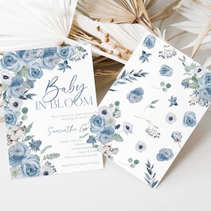 May include: Blue and white floral baby shower invitation with the text "Baby in Bloom" and the name "Samantha Cor". The invitation includes the date, time, and location of the shower.