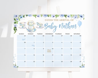 May include: A light blue baby shower calendar with the text "Guess the Arrival of Baby Nathan." The calendar features a floral design with teacups and a balloon. The calendar grid is light blue with dates.