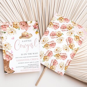 May include: A pink and white baby shower invitation with a floral pattern. The invitation says "A Little Cowgirl is on the Way!" and includes the name Samantha Green, the date and time of the shower, and the location. The invitation also includes a pink and white cowboy hat with flowers on it.