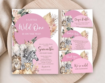 May include: A baby shower invitation set featuring watercolour illustrations of a giraffe, elephant, zebra, and lion. The design includes pink circular accents, dried palm leaves, and floral elements with text reading A Little Wild One Is On The Way.
