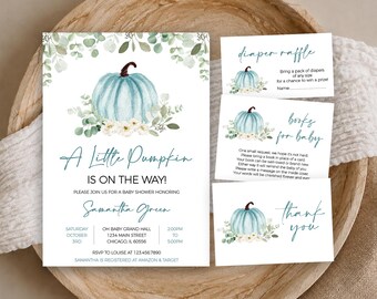 May include: A baby shower invitation set featuring a watercolor light blue pumpkin with white flowers and eucalyptus leaves. The text reads A Little Pumpkin Is On The Way, Diaper Raffle, Books For Baby, and Thank You, with event details included.