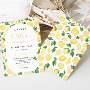 May include: A white baby shower invitation with a lemon theme. The invitation features a watercolour illustration of lemons and leaves. The text on the invitation reads "A Sweet Little One Is On The Way" and includes the date, time, and location of the shower.