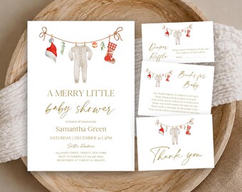 May include: A set of white baby shower stationery featuring watercolor illustrations of a clothesline with a Santa hat, baby onesie, and Christmas stocking. The text includes A MERRY LITTLE baby shower, Diaper Raffle, Books for Baby, and Thank you.