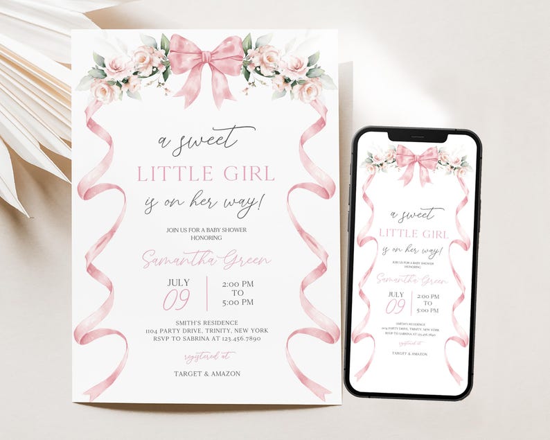 May include: A pink and white baby shower invitation featuring a pink bow and floral design. The text reads "a sweet little girl is on her way!" and includes the date, time, and location of the event. The invitation also includes the text "Target & Amazon" for gift registry information.