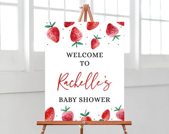 Könnte beinhalten: Willkommen zur Babyparty von Rachelle Schild mit weißem Hintergrund und roten Aquarell-Erdbeeren. Das Schild hat schwarze Punkte und grüne Blätter.