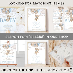 May include: A set of printable baby shower decorations featuring a teddy bear holding balloons. The decorations include a welcome sign, a diaper raffle sign, a thank you sign, and a baby shower invitation. The decorations are in blue and brown colors with a watercolor style.