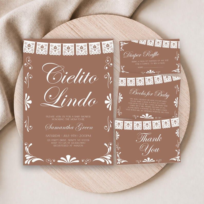 May include: A set of brown baby shower stationery featuring white papel picado banner graphics and elegant script text. The main invitation reads Cielito Lindo, Samantha Green, and event details. Includes a diaper raffle card, book request, and thank you card.