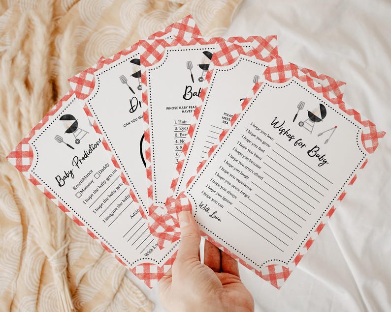 May include: A set of printable baby shower game cards with a red and white gingham pattern. The cards feature a grill and other barbecue-themed illustrations. The text on the cards includes "Baby Predictions", "Wishes for Baby", and "Whose Baby Feat Have You Guessed?"