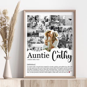May include: A framed black and white photo collage with the text "Auntie Cathy." The collage features multiple small photos of people. Below the text is a definition of an aunt.