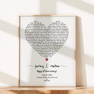 May include: Framed print with a heart-shaped design filled with song lyrics. The print includes the names "James & Maria", "Happy 8th Anniversary!", and the date "July 03, 2021". The song title "I Wanna Grow Old With You" is also featured.
