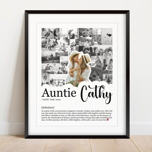 May include: Black framed print featuring a photo collage and the words "Auntie Cathy." The collage includes black and white photos of a woman and child. The definition of "auntie" is also included in the print.