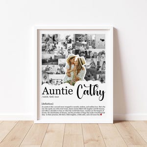May include: A framed black and white photo collage with the words "Auntie Cathy" in a decorative font. The collage includes multiple small photos of a woman and child. The definition of "Auntie" is also included.