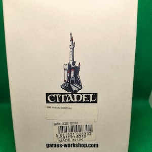 May include: A white box with a Citadel logo and a castle illustration. The box has a barcode and the text "BATCH CODE: 920183 5 011921 026302 C0818213015 MADE IN UK games-workshop.com".